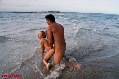 Fairy-haired alluring girl fucked in ass in the sea