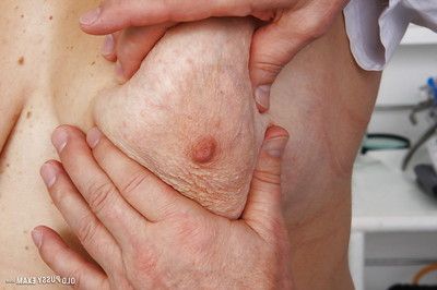 Mature fatty with hairy pussy receiving enema from gyno doctor