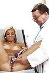 Smiley blondie receives her snatch stuffed with various containers at her gyno exam