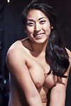 Eastern cutie Mia Li gets masturbated against her will on bondage table