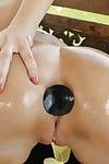 Oiled chick Leyla Peachbloom masturbates her ass with anal toys