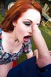 Redheaded Euro young Ella Hughes engulfing a big dick outdoors