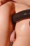 Handcuffed and chained Chelsey Lanette having huge phallus exchanger inserted into dark hole
