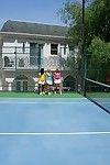 Extreme lesbo girls stripping and giving a kiss on the tennis court