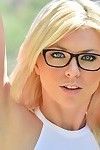 Hawt blonde in glasses and underclothes with big tits puts dildo in ass outdoors