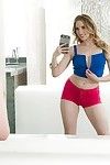 Clothed golden-haired Riley Reyes taking selfie ahead of inserting sex toy in asshole