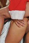 Lively golden-haired Nikky Thorne in sexy uniform gets her asshole dug by Santa