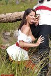 Bosomy brunette Angel Darkish covered in white and red takes hard fat cock in the long grass