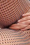 Hot brown hair in crotchless bodystocking uses heavy marital-device on shiny on top bawdy cleft