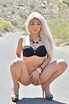 Perspired golden-haired amateur takes her clothes off uncovered on road ahead of heading side for masturbation