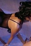 Alluring dark brown Edita Bente has her sheer teddy bared and her chocolate hole forced