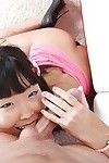 Appealing Eastern schoolgirl Candy Vivian bending over for unfathomable anal fuck