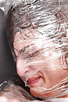 Horny milf Klarisa Leone receives wrapped by plastic bag and dug