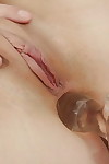 Moist brown hair model Gitti Pumps sliding a anal vibrator up inflexible rectal hole