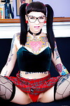 Tattooed Necro Nicki in pigtails & petticoat on knees showing firm a-hole