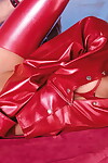 Untraditional redhead in red latex outfit plays freaky act of love games and does anal act of love as well