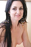 Passionate dark brown MILF undressing and satisfying she is with marital-devices