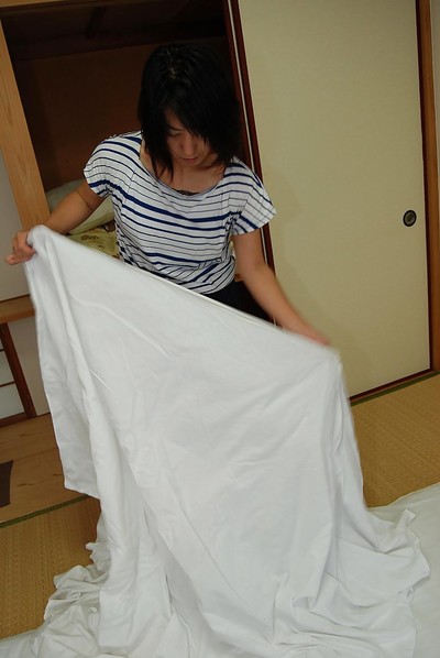 Priceless Japanese dark brown hotty Masako is set to take a damp shower-room