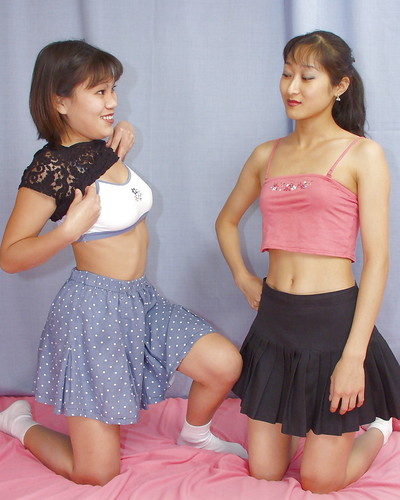 Lecherous Japanese lassies have some striptease and girl-on-girl humping pleasure