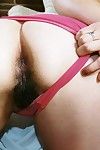 Chinese adolescent Junko showing off curly Chinese cunt afterward panty removal