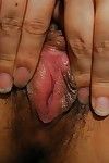 Chinese gal Risa Yamane posing exposed and showcasing her pink vagina in close up