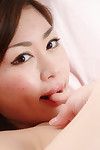 Close up youthful undressing scene features Eastern amateur Yumi