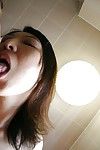 Raunchy Chinese MILF Naho Tajiri gives a carnal oral sex in the shower-room