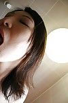 Raunchy Chinese MILF Naho Tajiri gives a carnal oral sex in the shower-room