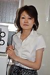 Shy seasoned Chinese lady Takako Kumagaya undressing and expanding her legs