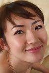 Teen Japanese infant Kuki demonstrates her unshaved fur pie in close up