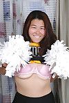 Eastern infant takes her clothes off off cheerleader uniform previous to amplifying vagina lips