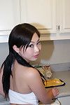 Chinese principal timer sliding shorts over apple bottoms in kitchen for gentile stretching