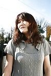 Oriental MILF Michiko Sudo undressing and vibing her trimmed vagina