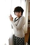 Eastern milf Yoshiko Sakai takes a bathroom and demonstrates compact milk cans