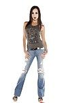 Brunette hair milf with a complete body Katsuni posing in jeans and high heels