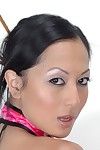 Sexually intrigued oriental lady Gianna Lynn removes clothes from bottom to top uncovered and expands