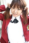 Lusty Japanese coed in uniform flashing her underclothing and compact love muffins