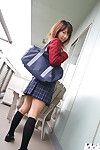 Lusty Japanese coed in uniform flashing her underclothing and compact love muffins