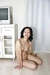 Raunchy Japanese MILF Aya Sakuma undressing and exposing her holes