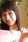 Smiley oriental youthful Miyuki Itou undressing and expposing her cum-hole in close up