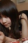 Oriental adolescent Etsuko Hatanaka undressing and exposing her gentile in close up