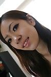 Oriental young Harumi Matsuda undressing and exposing her babe pot