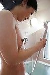 Lusty Chinese MILF with severe tit buttons winsome washroom and rubbing her body