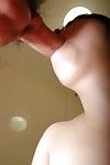 Lusty Japanese infant gives a fleshly oral play on a swollen schlong in the shower