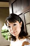 Charming Chinese amateur beauty Nana Nanami uncovering her delightful bows