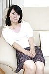 Oriental cutie Tomoe Asai removes clothes down and has some uterus toying and fingering getting pleasure