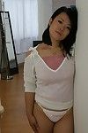 Oriental cutie Tomoe Asai removes clothes down and has some uterus toying and fingering getting pleasure