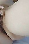 Chinese MILF Shiho Tanimura undressing and toying her unshaved gash