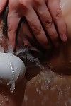 Japanese MILF delicious baths and teasing her bushy gash with water jets