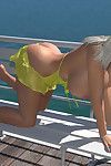 Busty 3d blonde babe shows her huge bra buddies under bikini outdoors